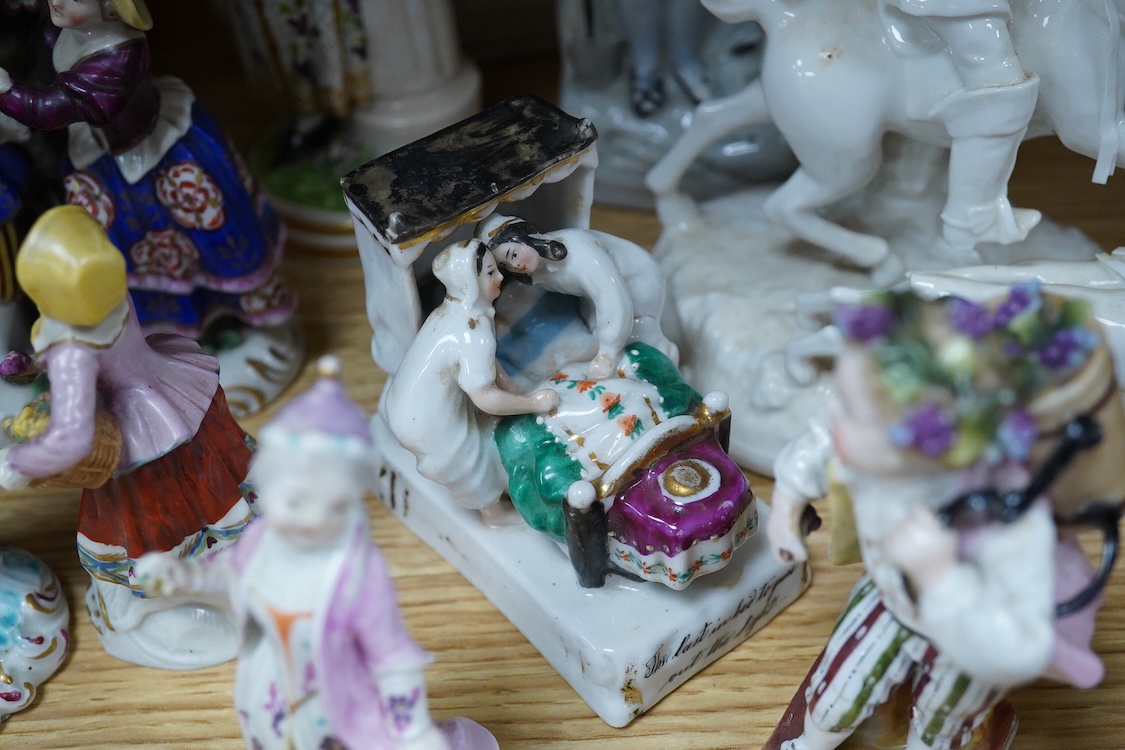 A collection of 19th century porcelain and ceramic figures, mostly Staffordshire, largest 28cm high